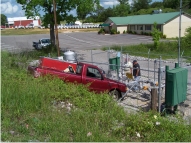 Truck crosses road with driver